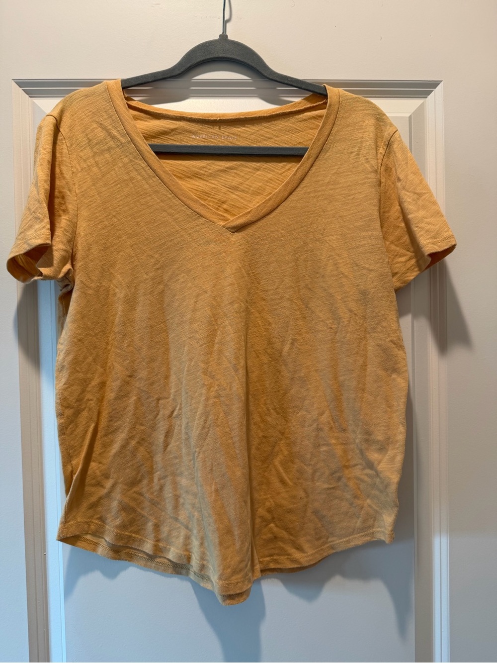 American Eagle Outfitters Women's V-Neck Tee in Mustard Yellow